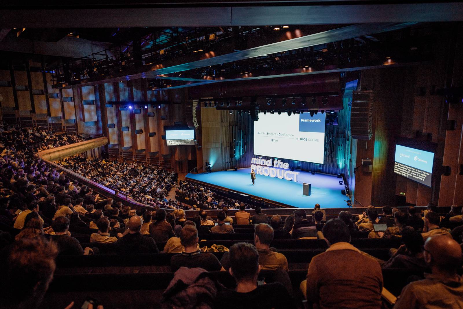 Ezinne Udezue delivering a keynote to a packed Barbican Hall at Mind the Product London